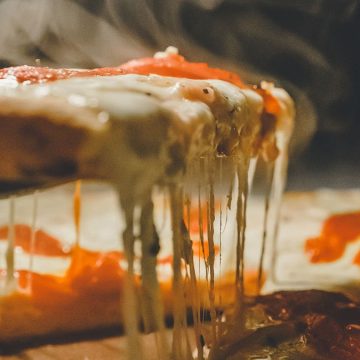 Aumenti bolletta pizzaiolo vetrina